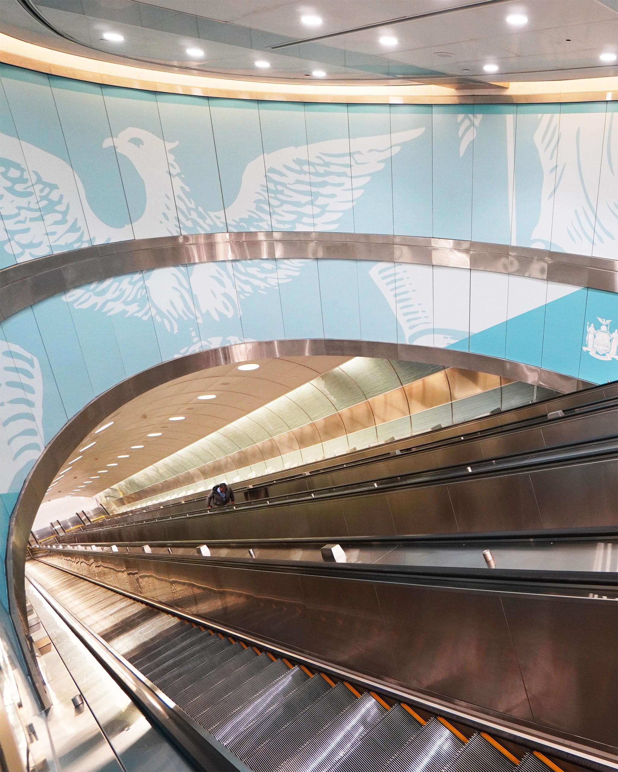 escalator down to train station