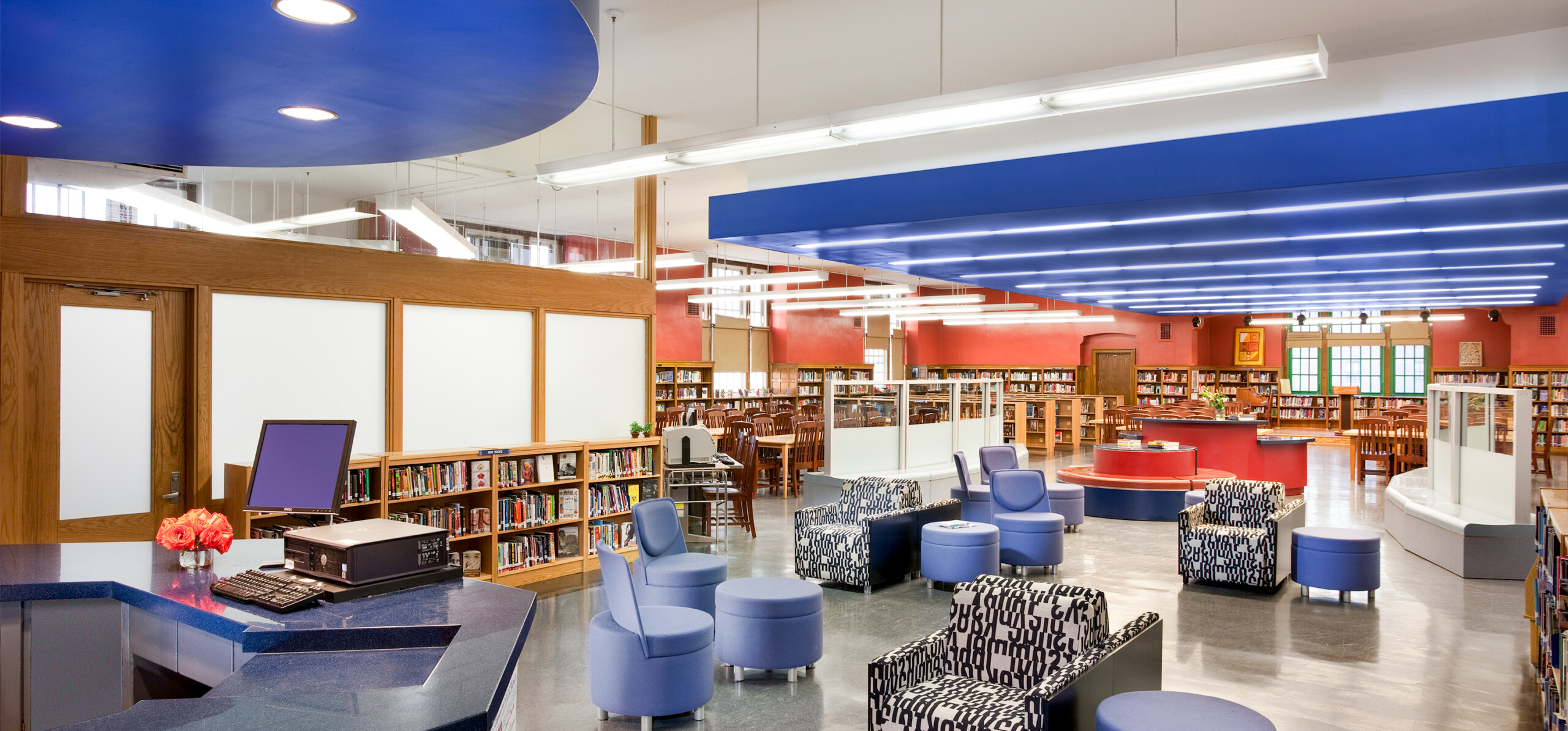 New Visions Public Libraries front desk and seating area